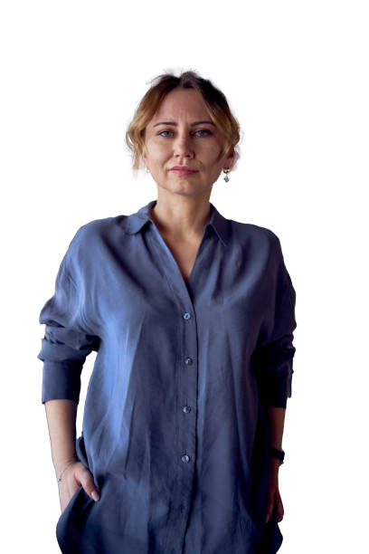 an attractive middle age woman walks in a modern coworking neutral design, wearing wide leg pants and a silk blouse attractive middle age woman walks in a modern coworking neutral design, wearing wide leg pants and a silk blouse people walking png stock pictures, royalty-free photos & images