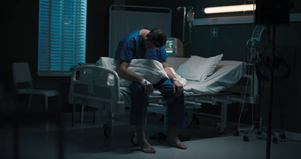 istock This guy in hospital room keeps wandering around, searching for something 2195993203