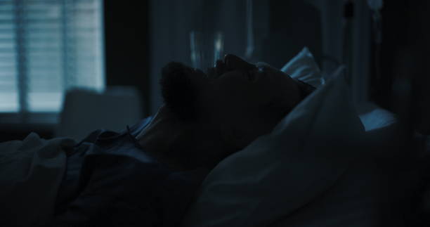 istock Man in a hospital room screams loudly, his cries echoing 2195993349