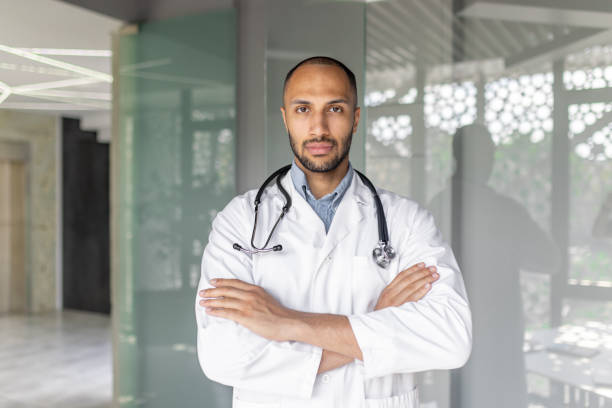 istock Confident doctor with stethoscope in modern medical office setting 2195997762