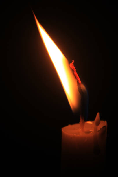 istock close up photo of candle light 2195997957