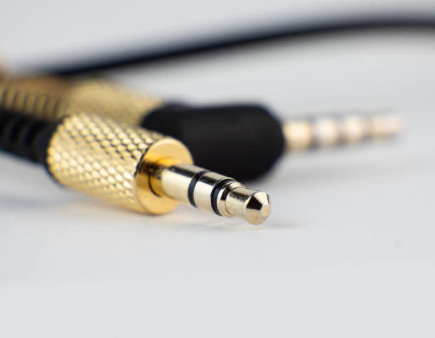 istock Close-up view of gold-plated audio connector. Jack cable 2196001587