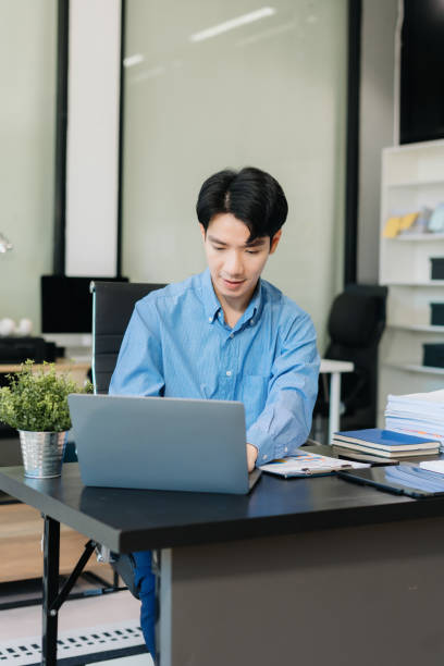 istock Business man working at office, financial adviser analyzing data. 2196003135