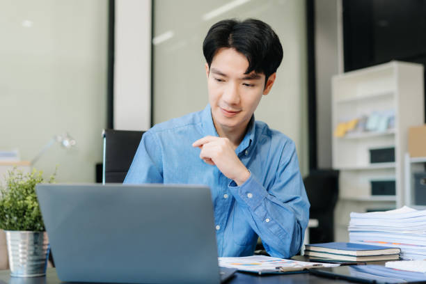 istock Business man working at office, financial adviser analyzing data. 2196003136