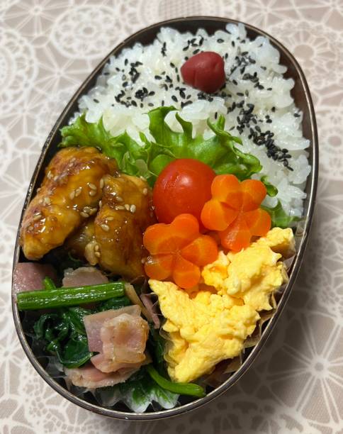 istock A traditional Korean dosirak, beautifully arranged with rice, assorted banchan, and savory proteins. Balanced and visually inviting, it’s a portable meal packed with vibrant flavors. 2196004082