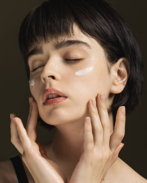 istock Cream on face. Skin care 2196005582