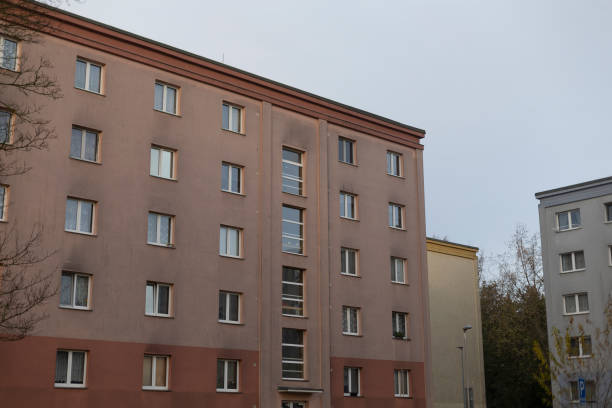 istock Residential Apartment Building Set Against a Dynamic Urban Background 2196010703