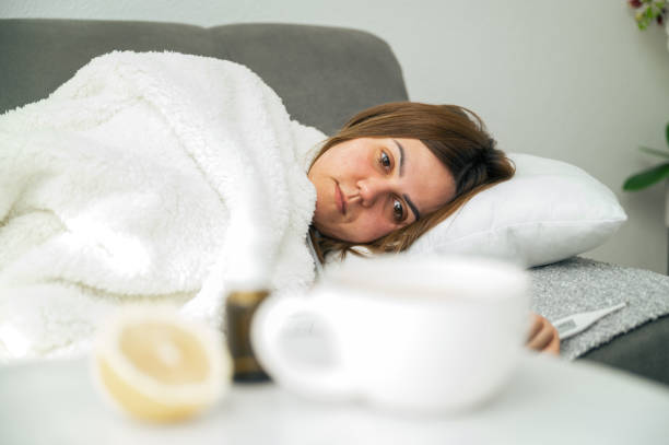istock Woman Resting with Smartphone at Home 2196013957