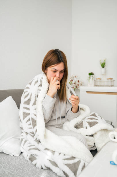 istock Woman Resting with Smartphone at Home 2196015043