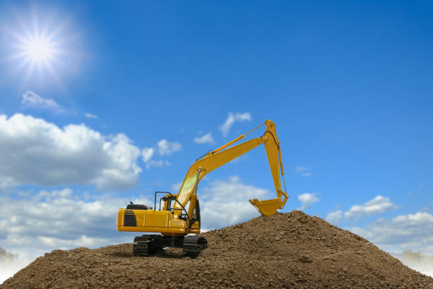 Excavator buckets on a construction site.