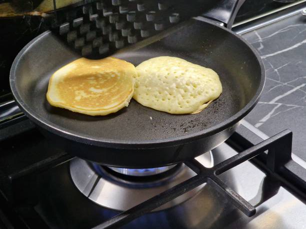istock cooking American pancakes with milk 2196018202