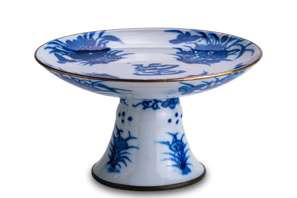 istock Closeup view of ancient blue pattern chinese ceramic footed tray isolated on white background. 2196021971