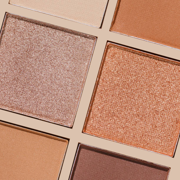 istock Cosmetics texture pattern, makeup palette vivid neutral color eye shadow, square eye powder swatches. Female cosmetic and beauty products, aesthetic minimal beauty photo, colorful eyeshade, top view 2196023129
