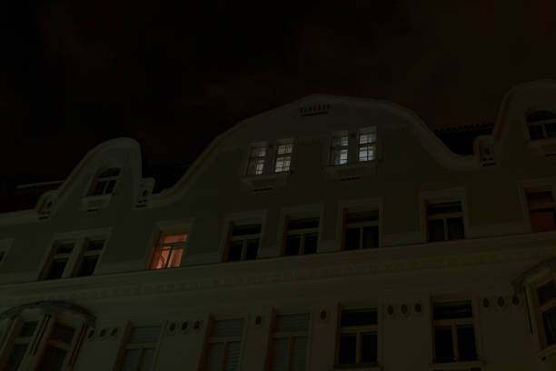 istock A large building featuring numerous windows is beautifully lit up at night 2196025376