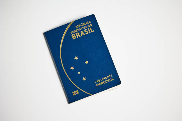 istock Brazilian passport on white background 2196025663