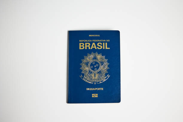 istock Brazilian passport on white background 2196025665