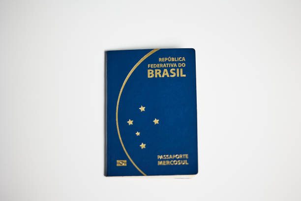 istock Brazilian passport on white background 2196025666