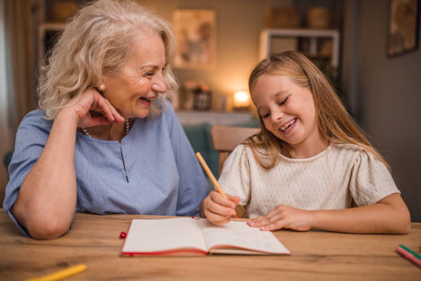 istock Grandma and granddaughter study and spend time together 2196033935