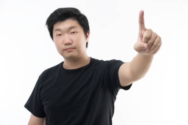 Asian man pointing his finger