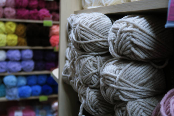 multicolored yarn balls in the shop window