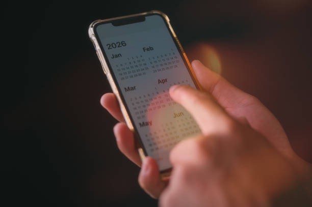 istock Concept for financial planning and reminder for 2026. man using smartphone working with calendar 2026, business planning marketing and investment 2196036965