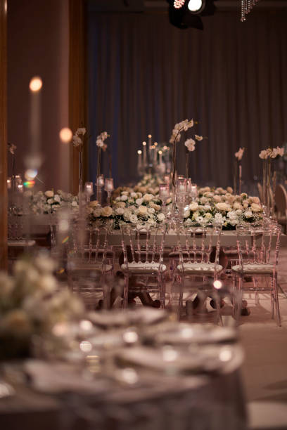 istock Elegant Wedding Reception Table with Floral Decorations 2196037223