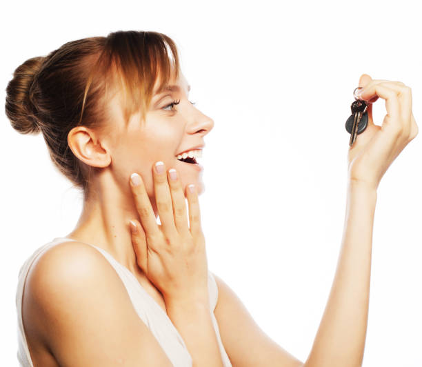 istock young businesswoman with key 2196037229