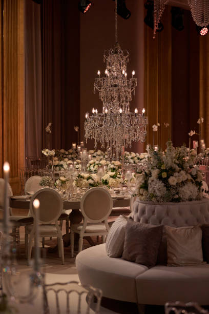 Elegant Wedding Table Setting with Crystal Chandelier. stock photo.