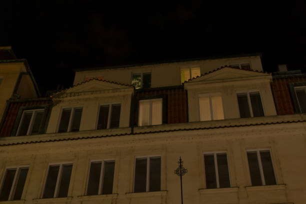 istock A very large building featuring numerous windows is beautifully lit up at night 2196038266