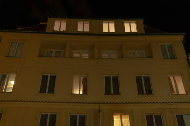 istock A tall building featuring numerous windows is beautifully lit up at night 2196038534