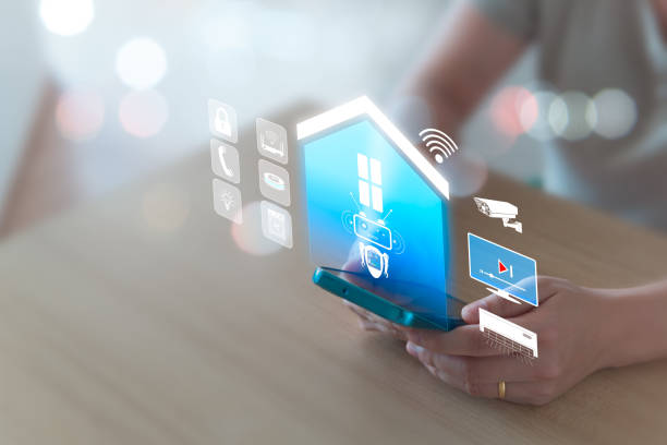 Smart home concept, remote control via mobile phone, Wi-Fi, AI assistant robot to control appliances and protect all connected systems in the home intelligently. Women use mobile phones to control.