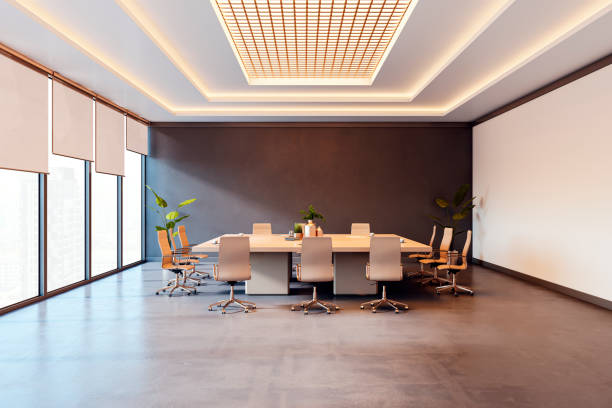 istock Modern conference room with large table, chairs, and minimal decor. 3D Rendering 2196039361