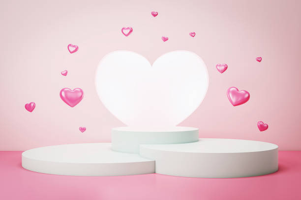 istock Abstract white podium with glowing heart and pink hearts on pink background. 3D Rendering 2196039495