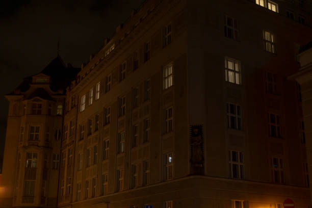 istock Nighttime Urban Architecture Featuring Buildings with Glowing Windows 2196039869