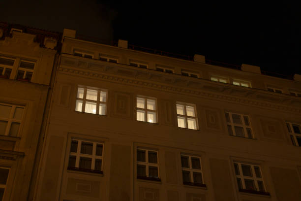 istock Beautifully Illuminated Windows of a Historic Building at Nighttime 2196040169