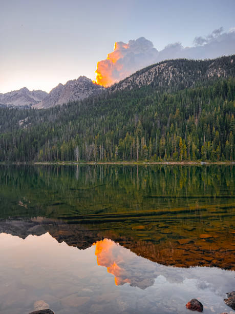 istock Reflection Of Mountain And Sunset Onto Lake 2196051662