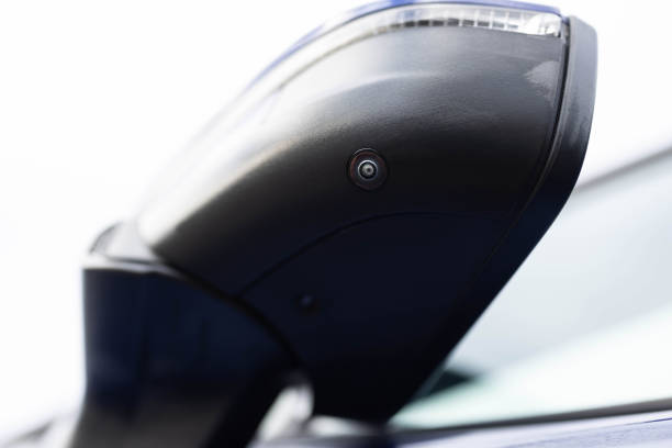 istock Surround view camera system in modern car, camera lens underneath side mirror, blind spot camera system. Parking assist systems. Surround View 360 Degrees, Reverse Camera, Front camera 2196051841