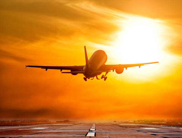 istock Passenger airplane take off airport runway against the backdrop sunrise 2196051929