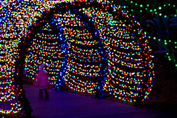 Motion blur child move into a tunnel of lights