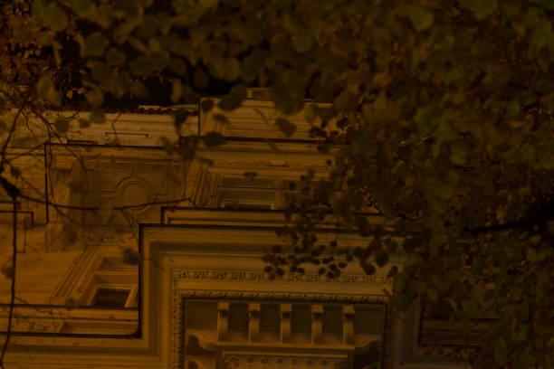istock A stunning building facade with illuminated leaves against an urban backdrop 2196055992
