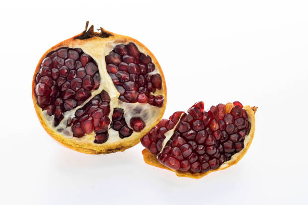 Pieces of pomegranate on white background.