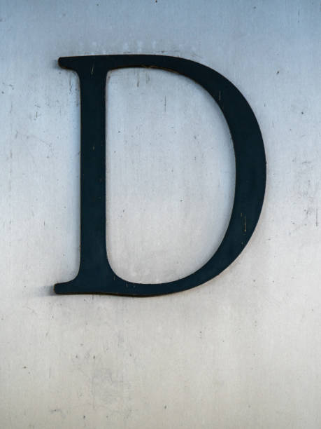 istock large letter D on a house wall 2196058217