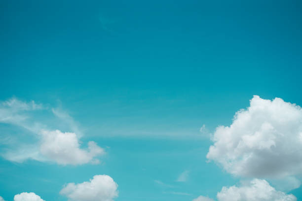 istock Beautiful white puffy clouds against blue sky on a sunny. Summer day. 2196065697