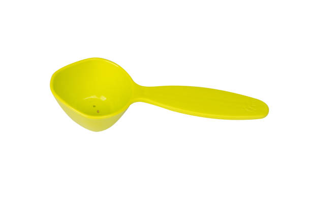 istock Green measuring spoon isolated on white background 2196067740