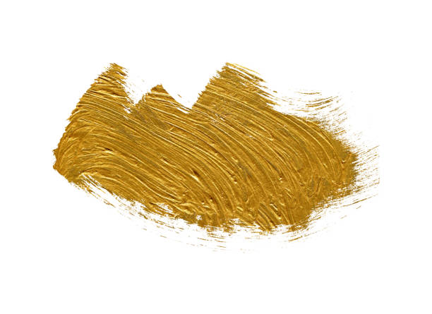 istock Strokes of golden paint isolated on white background 2196068003