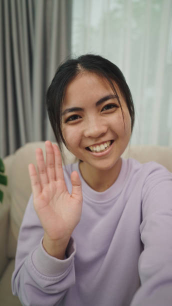 istock Teenager friendly greeting on a video call. 2196071060