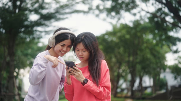 istock Asian teenagers watching on smartphone. 2196071845