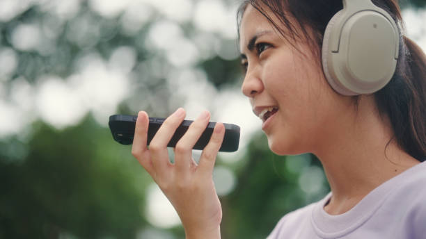 istock Young woman use ai voice assistant while travel. 2196072574