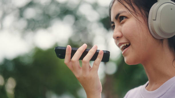 istock Young woman use ai voice assistant while travel. 2196072579