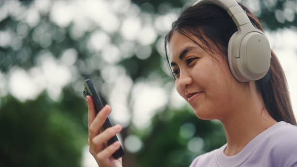 istock Young woman use ai voice assistant while travel. 2196072601
